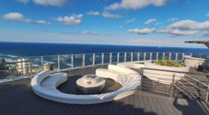 Luxury rooftop Infinity Skydeck featuring bespoke outdoor furniture and composite decking by EcoTech Group at The Oceans uMhlanga.